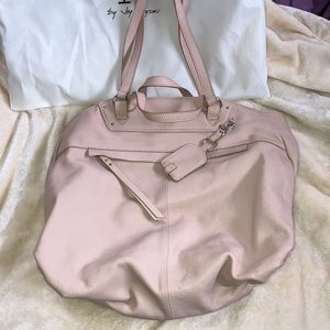 Pretty peachy pink leather handbag